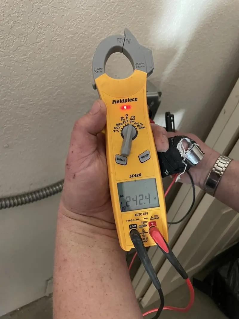 Voltage testing with clamp meter during Generator Installation in Sidney